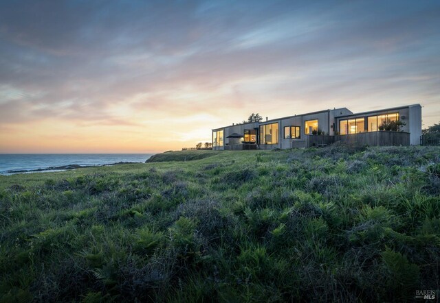 exterior space featuring a water view