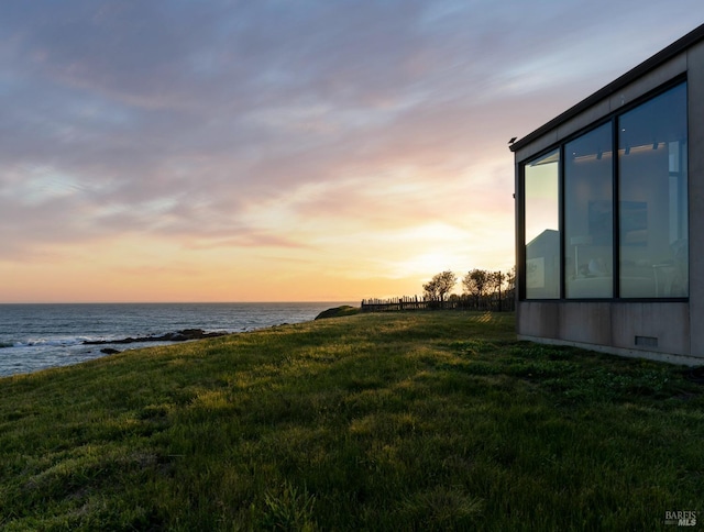 view of yard with a water view