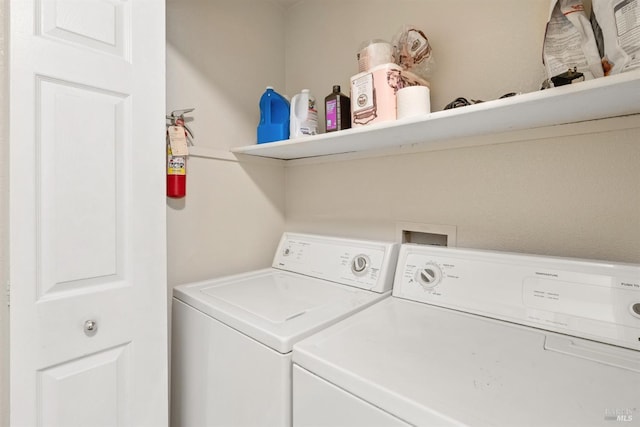 laundry area featuring laundry area and independent washer and dryer