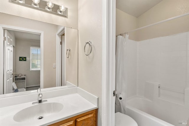 full bath with toilet, vanity, and shower / bathtub combination with curtain