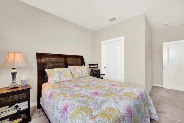 bedroom featuring carpet, visible vents, and baseboards