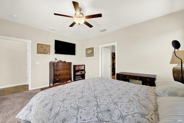 bedroom featuring visible vents, ceiling fan, and baseboards