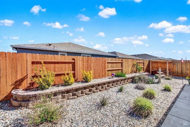 view of yard featuring a fenced backyard