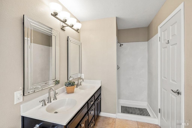 full bath with tile patterned floors, visible vents, a shower, and a sink