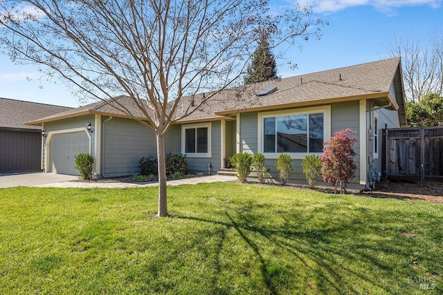 single story home featuring a front yard, concrete driveway, fence, and a garage