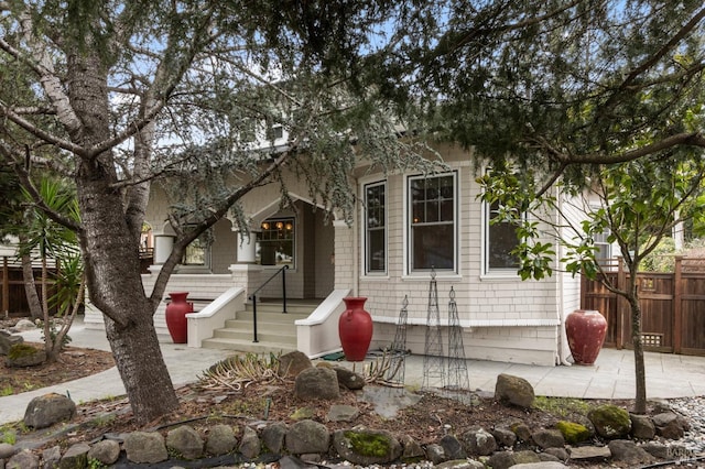 view of front of home with fence