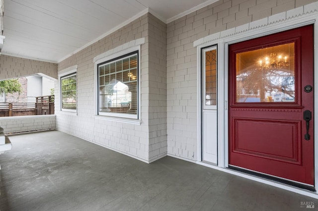 property entrance with a porch