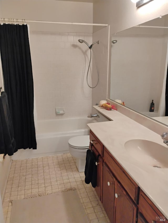 full bathroom with tile patterned flooring, vanity, toilet, and shower / tub combo