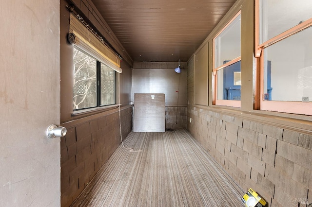 hallway featuring wooden ceiling