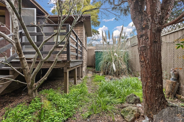 exterior space with a fenced backyard