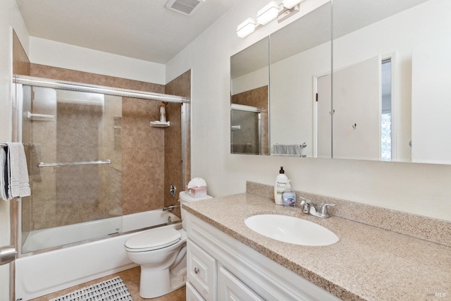 full bath featuring visible vents, toilet, shower / bath combination with glass door, tile patterned flooring, and vanity