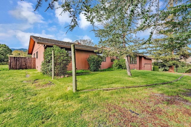 view of yard with fence