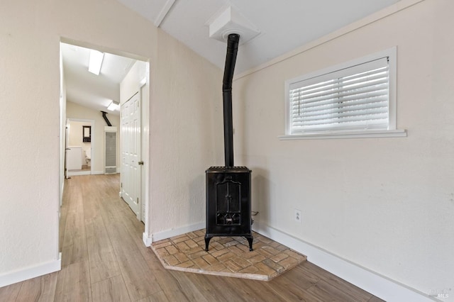 505 Petaluma Blvd N, Petaluma, CA 94952 - detailed view of a wood stove, wood finished floors, and baseboards