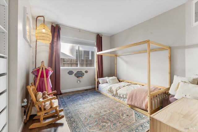 bedroom with baseboards
