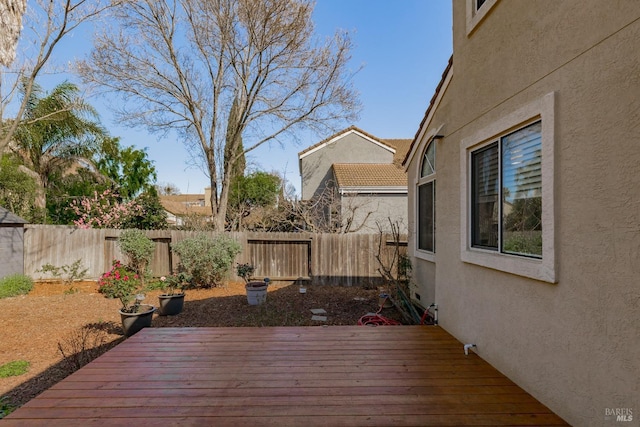 deck featuring a fenced backyard