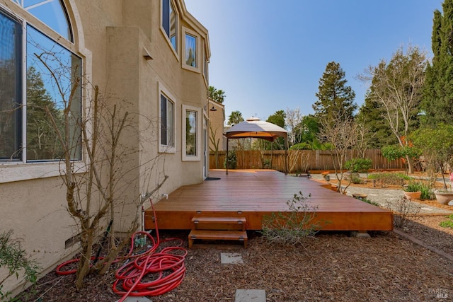 exterior space with a gazebo and fence