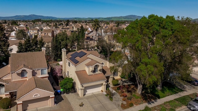 birds eye view of property featuring a residential view and a mountain view