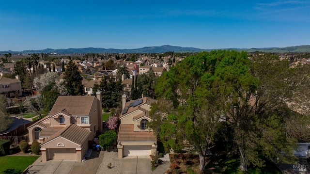 bird's eye view with a mountain view and a residential view