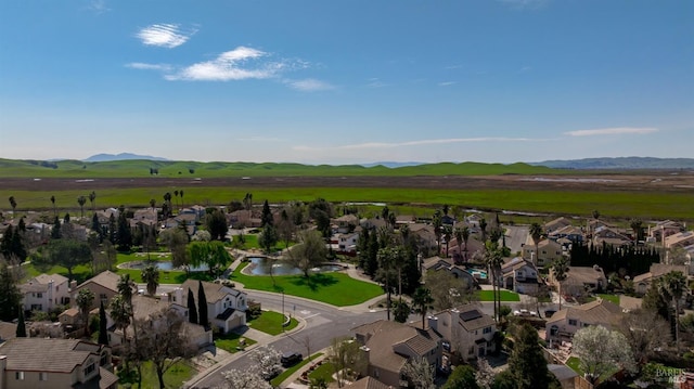 aerial view with a mountain view and a residential view