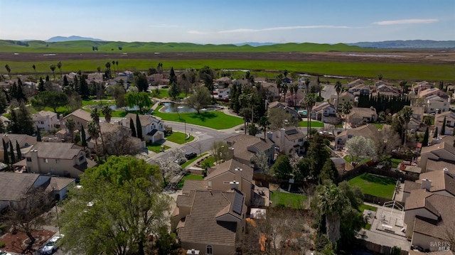 bird's eye view featuring a residential view and a mountain view