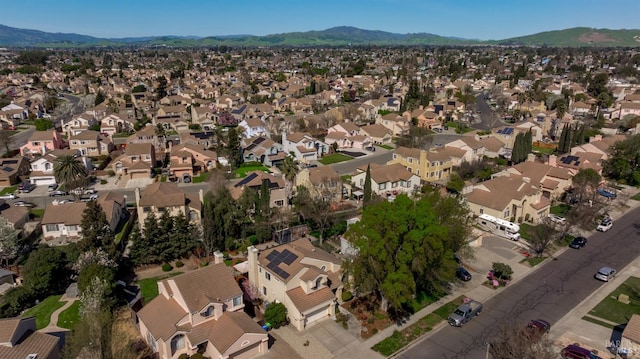 bird's eye view featuring a residential view and a mountain view