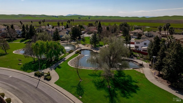 aerial view featuring a mountain view and a residential view