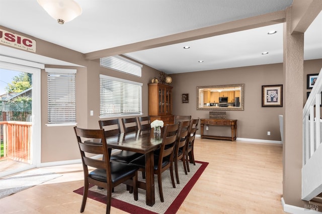 dining area featuring plenty of natural light, recessed lighting, baseboards, and light wood finished floors