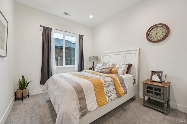 carpeted bedroom with recessed lighting, visible vents, and baseboards