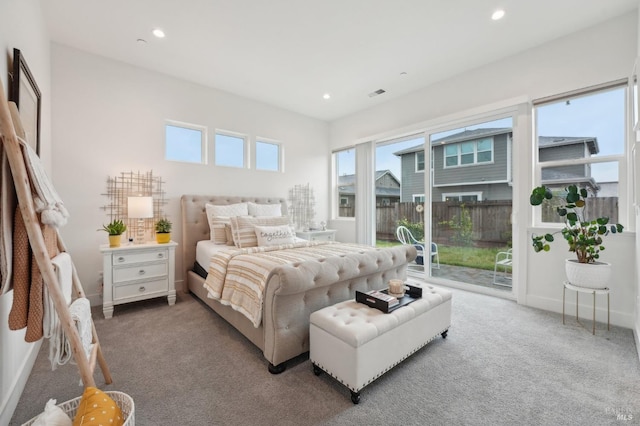 bedroom featuring visible vents, carpet floors, baseboards, recessed lighting, and access to exterior