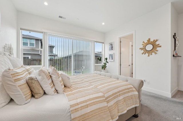 bedroom with recessed lighting, carpet flooring, visible vents, and baseboards