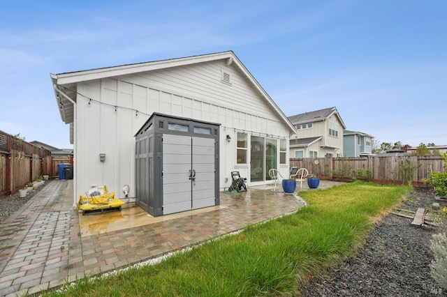 view of outdoor structure with a fenced backyard