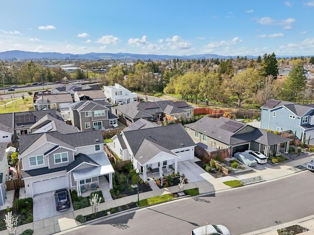 aerial view featuring a mountain view and a residential view