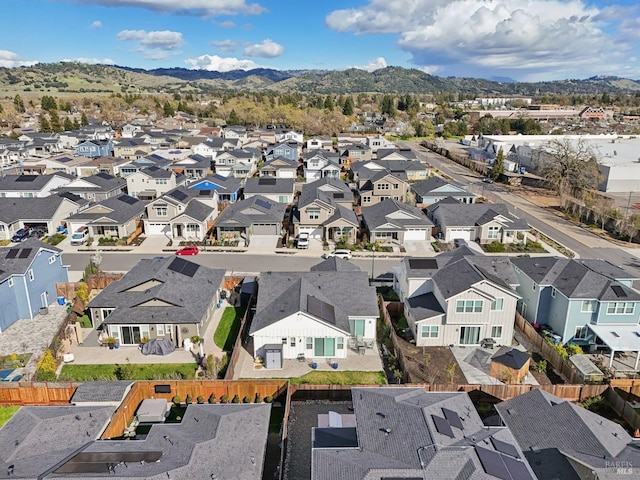 aerial view with a mountain view and a residential view