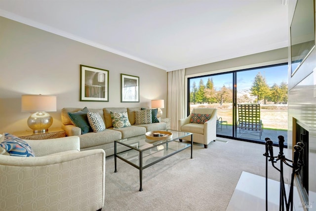 living area with ornamental molding and carpet flooring