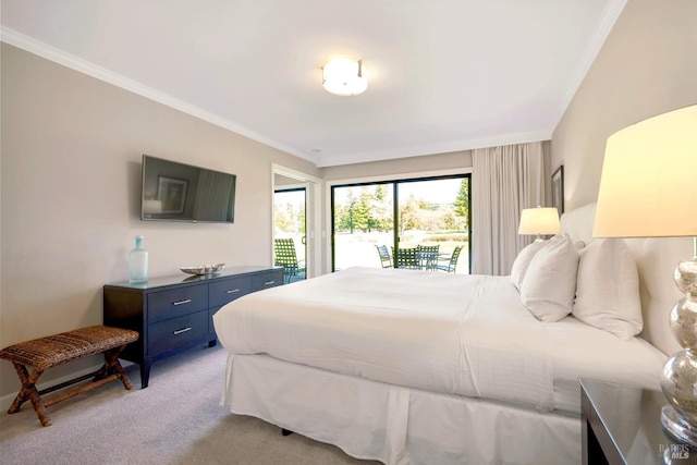 bedroom featuring light carpet, ornamental molding, and access to outside