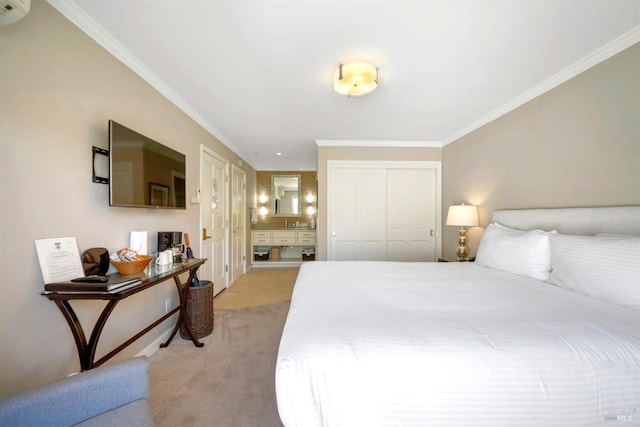 bedroom featuring light tile patterned floors, ornamental molding, a closet, ensuite bathroom, and light colored carpet