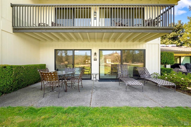 view of patio / terrace with a balcony