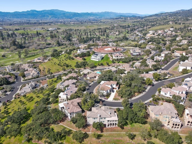 bird's eye view featuring a mountain view and a residential view