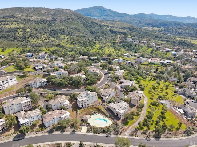 birds eye view of property featuring a mountain view and a residential view