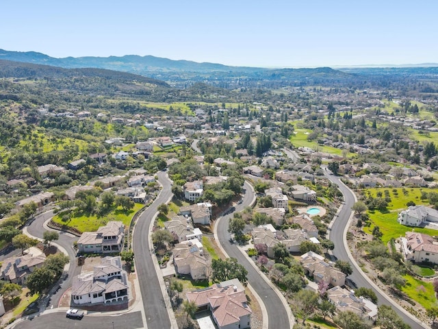 drone / aerial view featuring a mountain view and a residential view