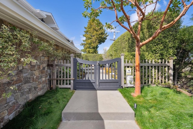 view of gate featuring fence