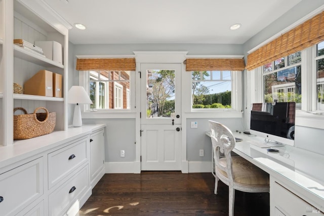 office with dark wood-type flooring, recessed lighting, baseboards, and a wealth of natural light