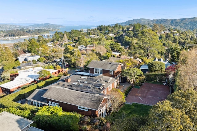 aerial view featuring a water and mountain view