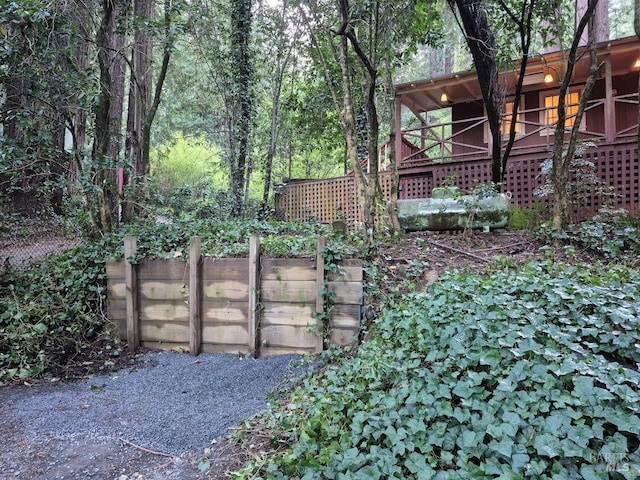 view of yard with a forest view