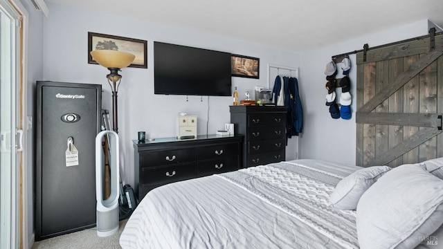 bedroom with a barn door