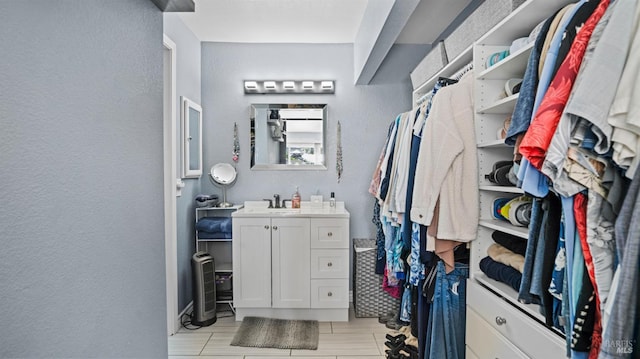 spacious closet with a sink
