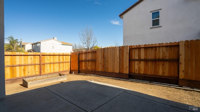 view of patio with a fenced backyard