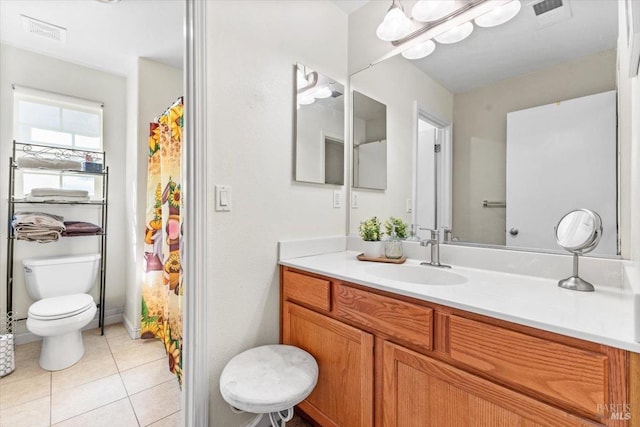 full bathroom featuring tile patterned floors, visible vents, toilet, and vanity