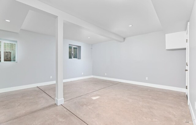 finished below grade area featuring recessed lighting and baseboards