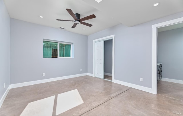 unfurnished bedroom featuring a ceiling fan, finished concrete flooring, baseboards, recessed lighting, and a closet